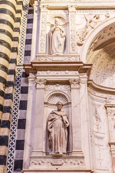 Siena, Italy, January 3, 2024: Siena Cathedral. Piccolomini altar with sculptures by Michelangelo