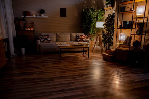 A stylish living room with warm lighting and modern, comfortable furniture to enhance comfort and aesthetics