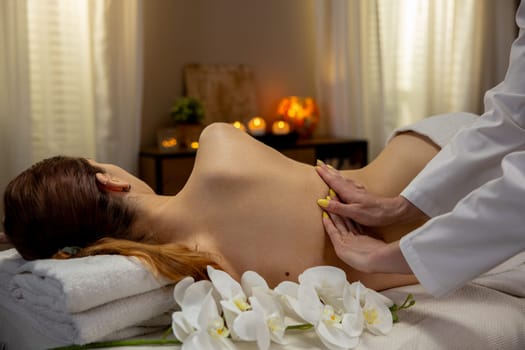 A beautiful and tranquil spa setting that showcases a soothing massage therapy session designed for ultimate relaxation
