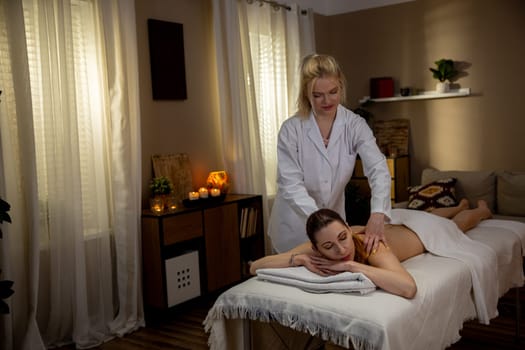 Experience ultimate tranquility and relaxation by indulging in soothing massage therapy at a serene spa setting