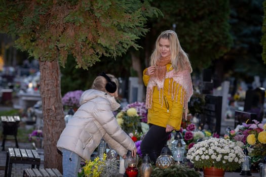 A deeply touching moment takes place in a cemetery, where cherished loved ones are remembered with beautiful flowers