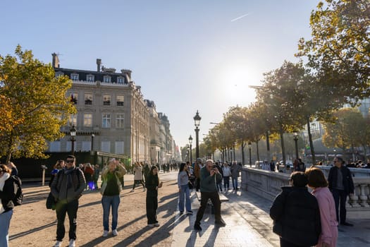 Central street of Paris The Avenue des Champs-Elysees with luxury shops and street life. Paris, France - November 24, 2024