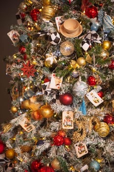 an elegant Christmas tree decorated with balls, toys and cups. miracle.vacation. holidays. fairy tale.