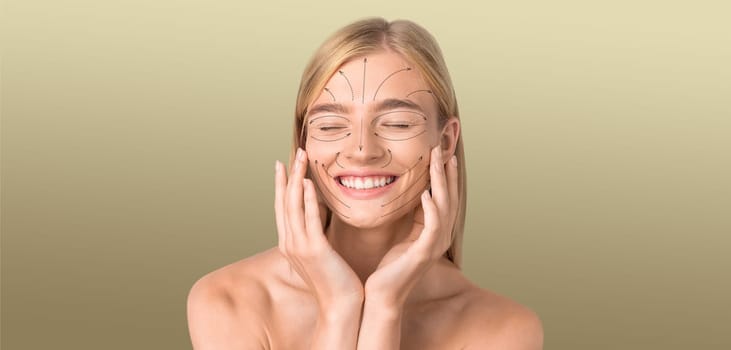 A young woman is smiling with closed eyes while applying skincare products to her face. She is in a calm, isolated environment with a smooth texture in the background, perfect for relaxation.