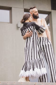 full length view of fashionable couple outdoor