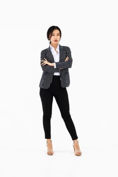 Asian woman full body portrait on white background wearing formal business suit . Jivy