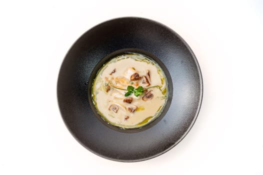 Mushroom cream soup with chiken. Food in asian style isolated. High quality photo.