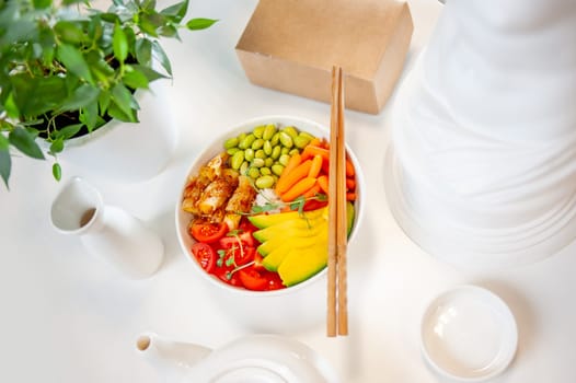 Vegetarian poke bowl with asparagus and edamame beans on white background. Top view. High quality photo.