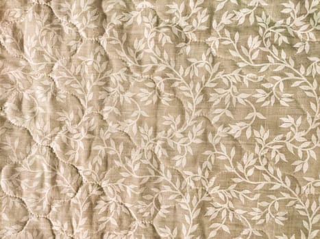 A softly textured background showcases delicate floral patterns, offering a stylish and elegant design element for various creative uses.