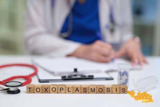 A qualified health professional analyzes treatment options for managing toxoplasmosis in patient care