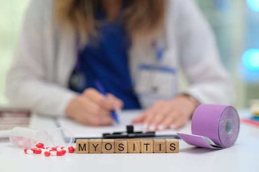 A healthcare professional examines myositis, focusing on accurate diagnosis and exploring therapy options
