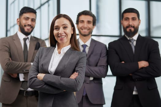 professional employees executives group posing together for corporate portrait, leadership