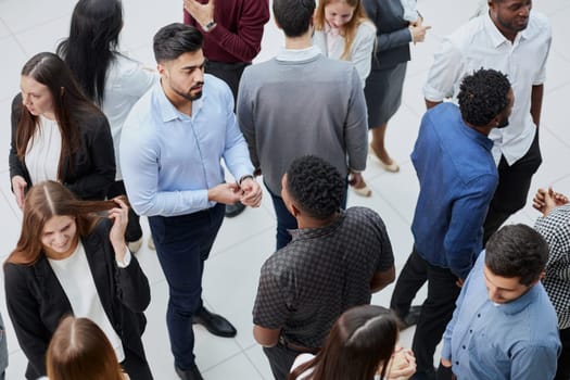 a group of successful young people communicate in a conference room