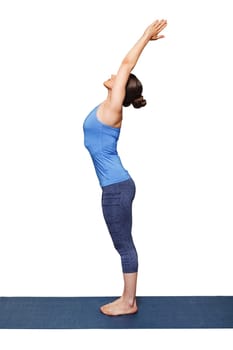 Woman doing Hatha Yoga asana Tadasana - Mountain pose with stretched hands isolated