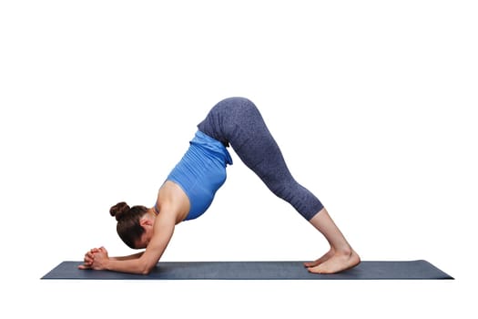 Woman doing Hatha yoga Surya Namaskar Sun Salutation asana Adhomukha svanasana variation - Ardha Pincha Mayurasana dolphin pose on yoga mat isolated on white background