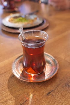 Traditional turkish tea on white table