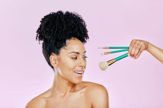 Makeup brush, happy and studio face of woman with tools for skincare glow, foundation product or wellness treatment. Beauty spa cosmetics, facial cosmetology and dermatology person on pink background.