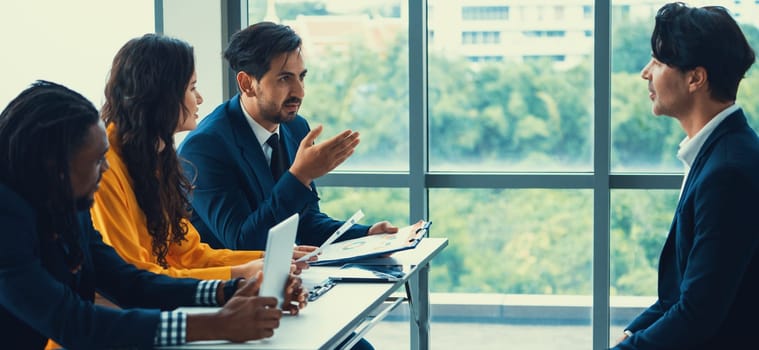 Diversity recruiters interview candidate at the bright office. A group of human resources professionals explaining an applicant for a new position. asking interviewee a question. Intellectual.