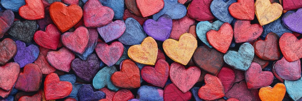 Valentines Day banner showcasing vibrant, colorful hearts in various shades. For expressing love, affection, this eye-catching design appeals to couples, gifts, romantic celebrations, for promotion