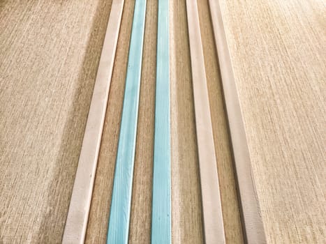 This visually appealing surface features alternating blue and beige stripes, providing a perfect backdrop for creative text arrangements and designs.