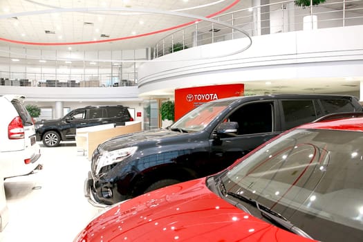 Kazan, Russia - November 25, 2022: Cars in showroom of dealership Toyota in Kazan in Russia