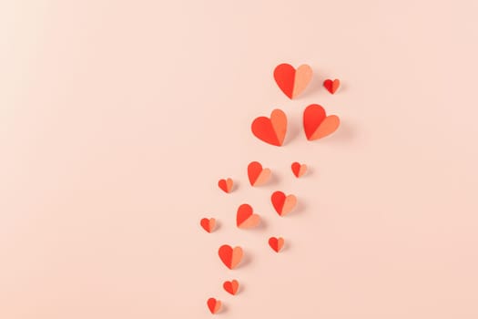 Happy Valentine Day concept, red paper hearts shape cutting isolated pastel pink background, Happy mother day, Symbol of love paper art elements with place for text, Banner design greeting card