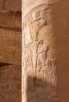 Detail of the carvings on the numerous stone columns supporting roof of Karnak Temple near Luxor
