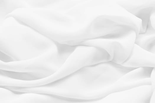 Weißer Hintergrund. Nahaufnahme von einem weichen weißen Stoff
