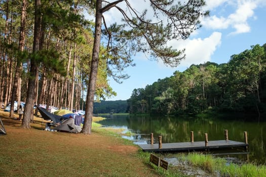 Camping on the lake in the pine forest at Pang Tong Under Royal Forest Park ( Pang Ung ), Mae Hong Son, Thailand. Pang Ung is a popular place to stay in a camping in the winter.