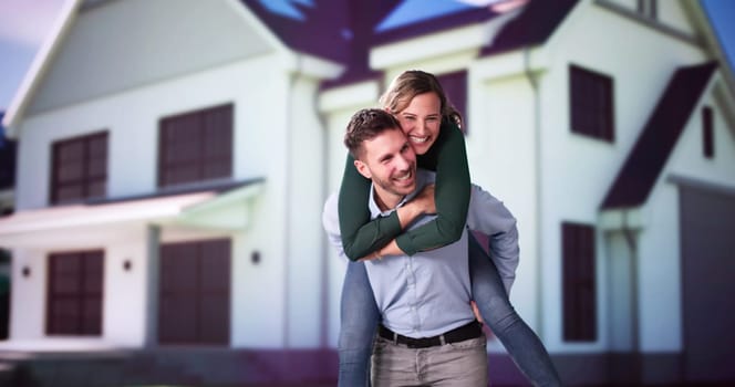 Portrait Of A Happy Family Standing Outside Their House With Solar Panels On Roof