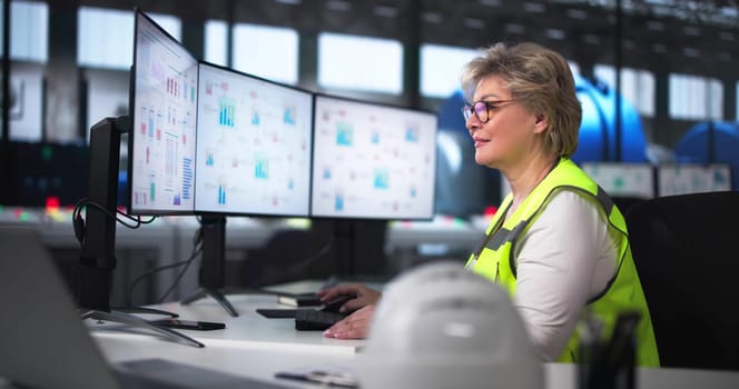 Woman Working In Power Plant Electricity Generation