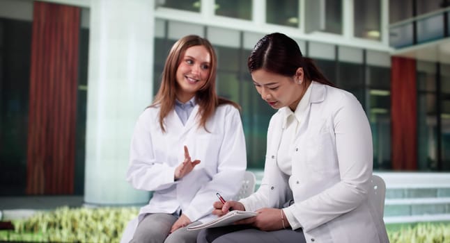University Students In Nurse And Doctor Uniforms Outside Campus During Break