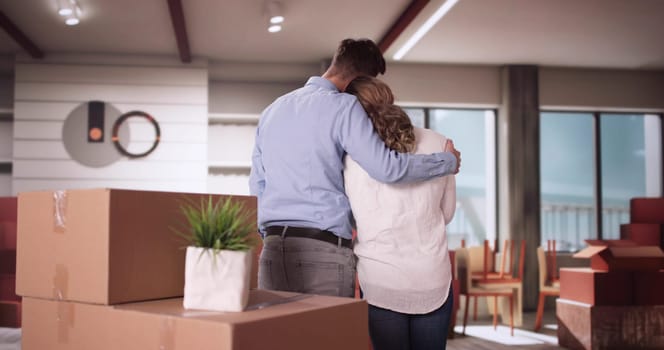 Young Couple Moving Into New House. Dream Real Estate