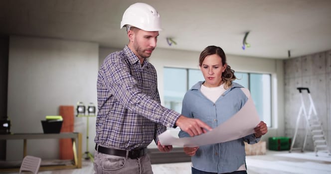 Home Construction Inspector And Interior Designer Contractor At Work