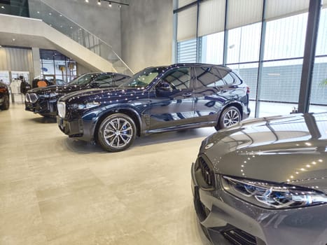 Tumen, Russia - November 09, 2024: Car in nice showroom of dealership BMW