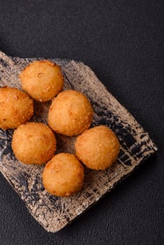 Crispy French fries with camembert or mozzarella cheese with cranberry or raspberry sauce