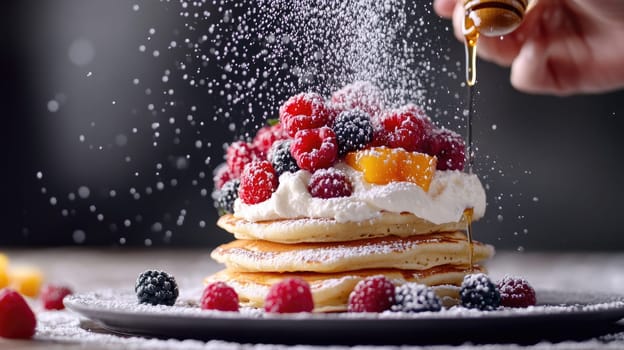 A colorful stack of fluffy pancakes is adorned with vibrant fresh berries, whipped cream, and a drizzle of honey, creating an inviting breakfast display in a cozy kitchen.