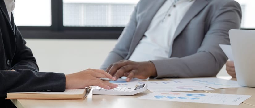 Business meeting to analysis and discuss the situation on the financial report in the meeting room. Investment Consultant, Financial advisor and accounting concept.