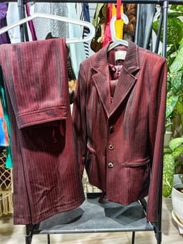 Explore a garage sale filled with gently used clothing, focusing on second-hand options to promote environmental sustainability.