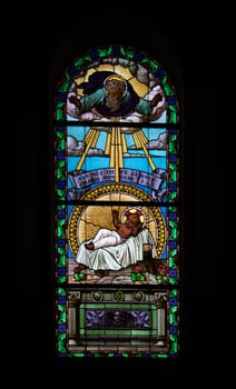 Lights come through the stained glass window