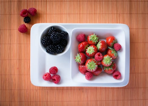strawberries, raspberries, blackberries