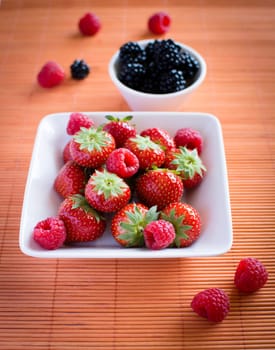 strawberries, raspberries, blackberries