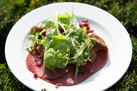 Beef Carpacio with rucola and parmesan