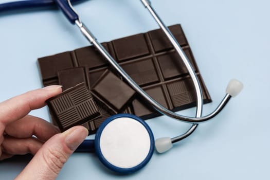 Delicious dark chocolate bar. Healthy eating concept. High quality photo