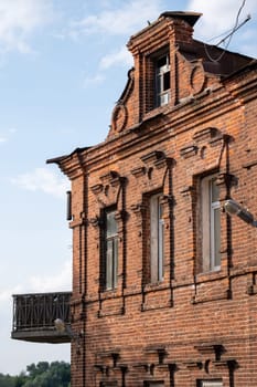 Pavlovo, Nizhny Novgorod Region, Russia - 07.17.2024. Old abandoned brick house.