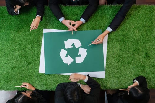 Top view panorama banner recycle icon on meeting table in office with business people planning eco business investment on waste management as recycle reduce reuse concept for clean ecosystem. Quaint