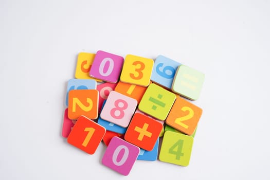 Number wood block cubes for learning Mathematic, education math concept.