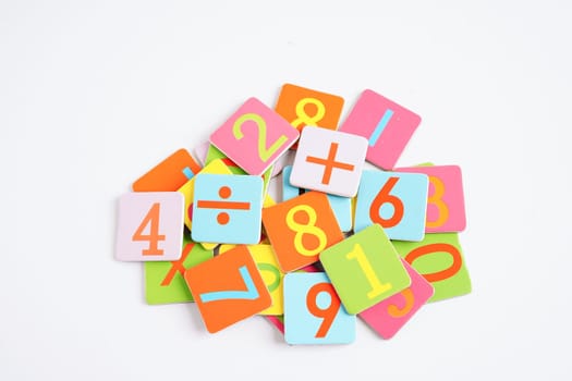 Number wood block cubes for learning Mathematic, education math concept.