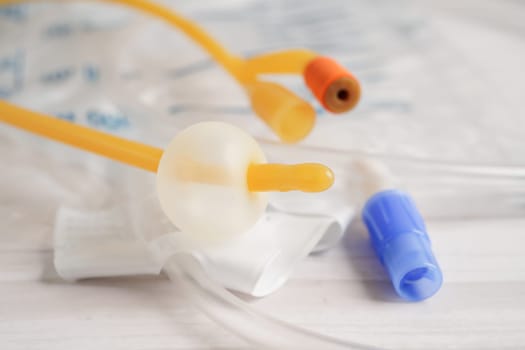 Foley catheter and urine drainage bag collect urine for disability or patient in hospital.