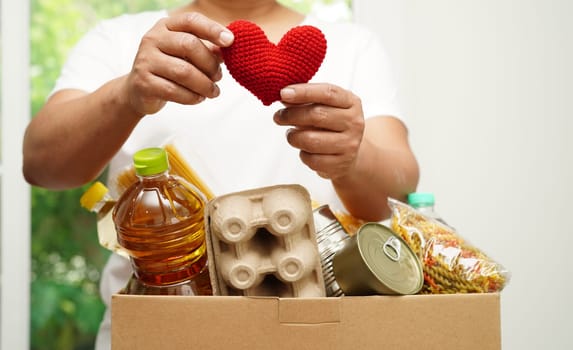 Asian woman holding human internal organ model, donation charity volunteer concept. 